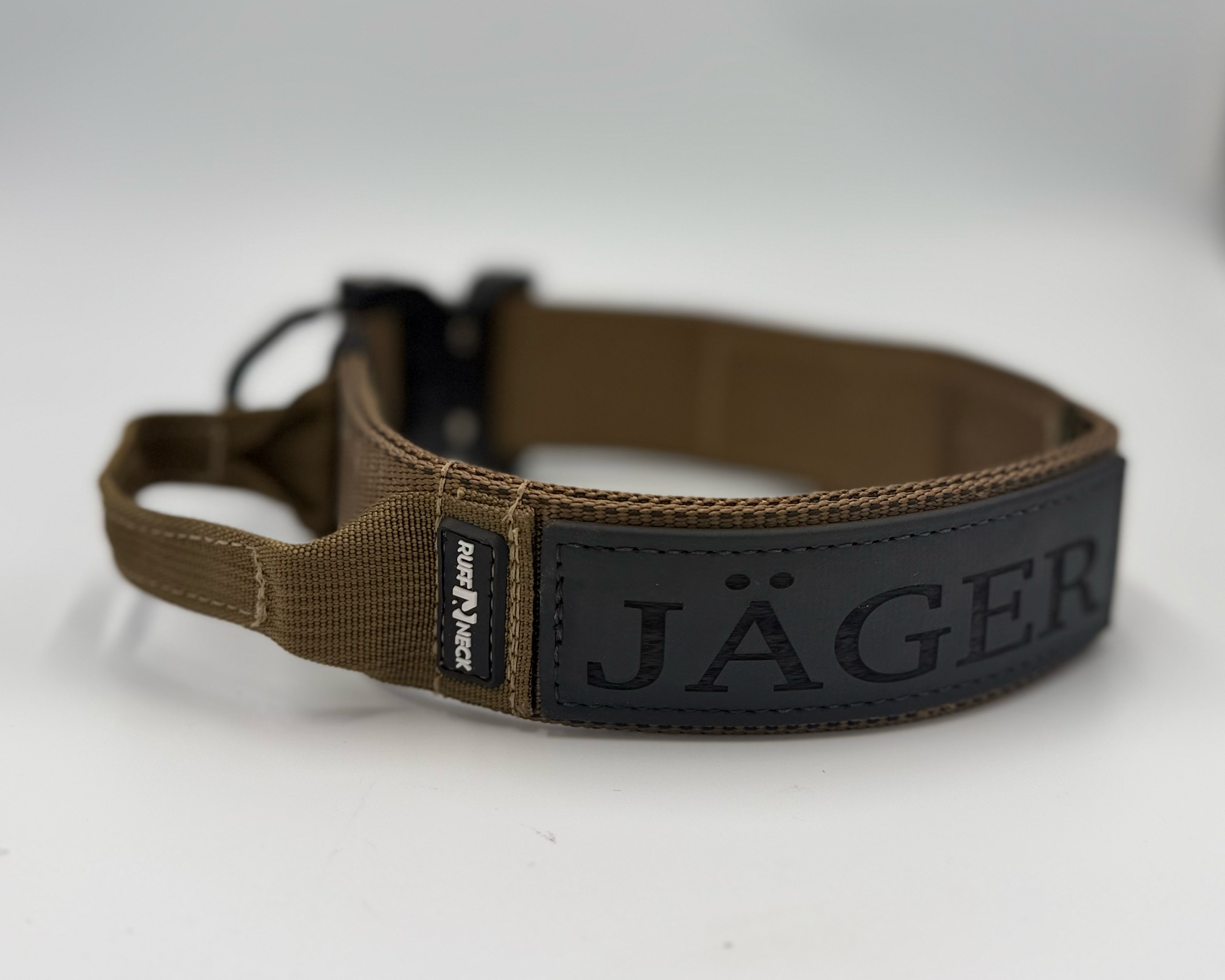 Titan Tactical Elite Dog Collar featuring 1.75" Mil-Spec Type 13 nylon webbing, a genuine AustriAlpin COBRA® Integrated D-Ring Buckle, RuffLock Retained Handle System, and the exclusive RuffTag Personalized BioThane Identification System. Handmade in the USA by American Ruffneck Collars.