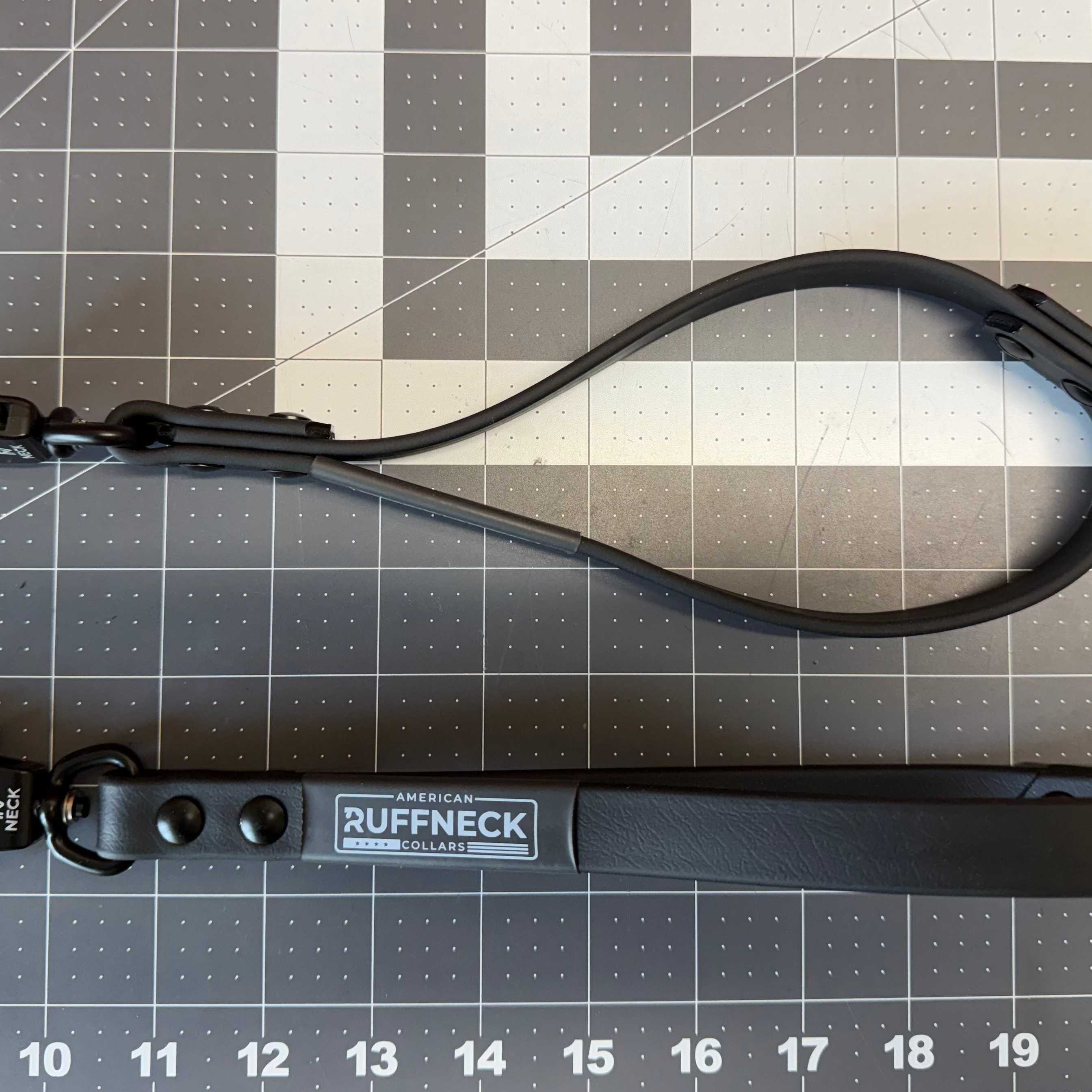 Close Quarters Control dog leash by American Ruffneck Collars, black nylon leash with metal clip for secure walking.