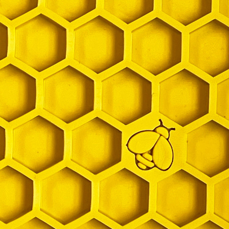 Large yellow SodaPup EMAT honeycomb design enrichment lick mat for dogs, made by True Dogs, LLC.
