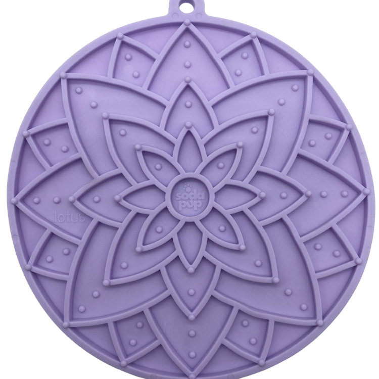 Pastel purple Lotus Design eMat enrichment lick mat with suction cups by SodaPup/True Dogs, LLC, for dog enrichment and mental stimulation.