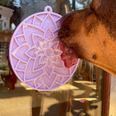 Pastel purple Lotus Design eMat Enrichment Lick Mat with suction cups by SodaPup/True Dogs, LLC, for dog enrichment.