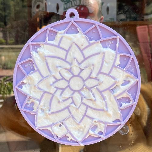 Pastel purple Lotus Design eMat Enrichment Lick Mat with suction cups from SodaPup/True Dogs, LLC, for pet enrichment and sensory stimulation.