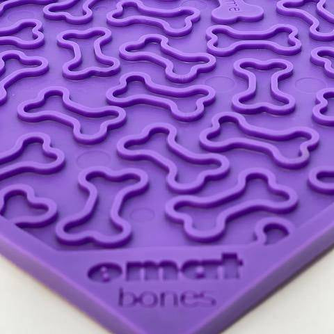 Purple Bones Design eMat Enrichment Lick Mat by SodaPup for dogs, featuring a bone pattern on a durable silicone surface.