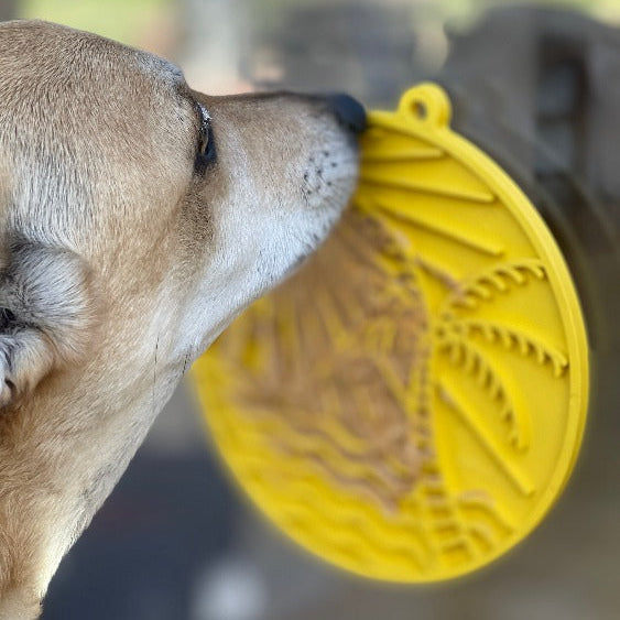 SodaPup Sun n' Sea eMat Enrichment Lick Mat with suction cups, bright yellow, designed for dog enrichment and slow feeding.