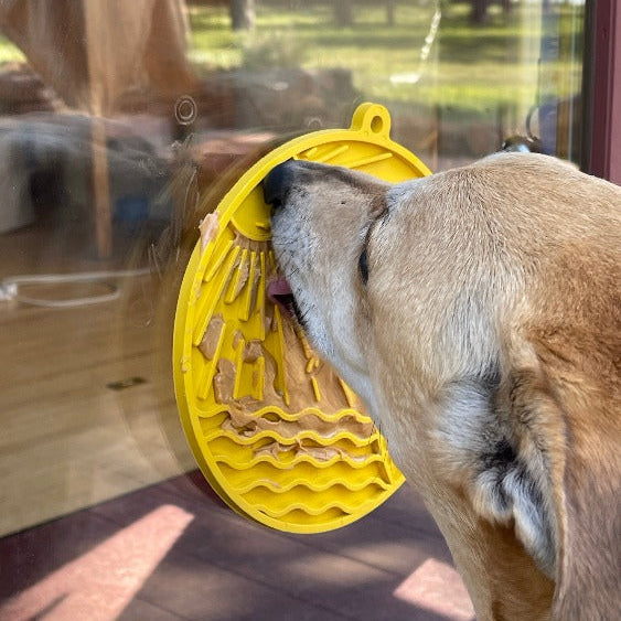 Sun n' Sea EMAT enrichment lick mat with suction cups by SodaPup, bright yellow, designed for dogs to promote mental stimulation.