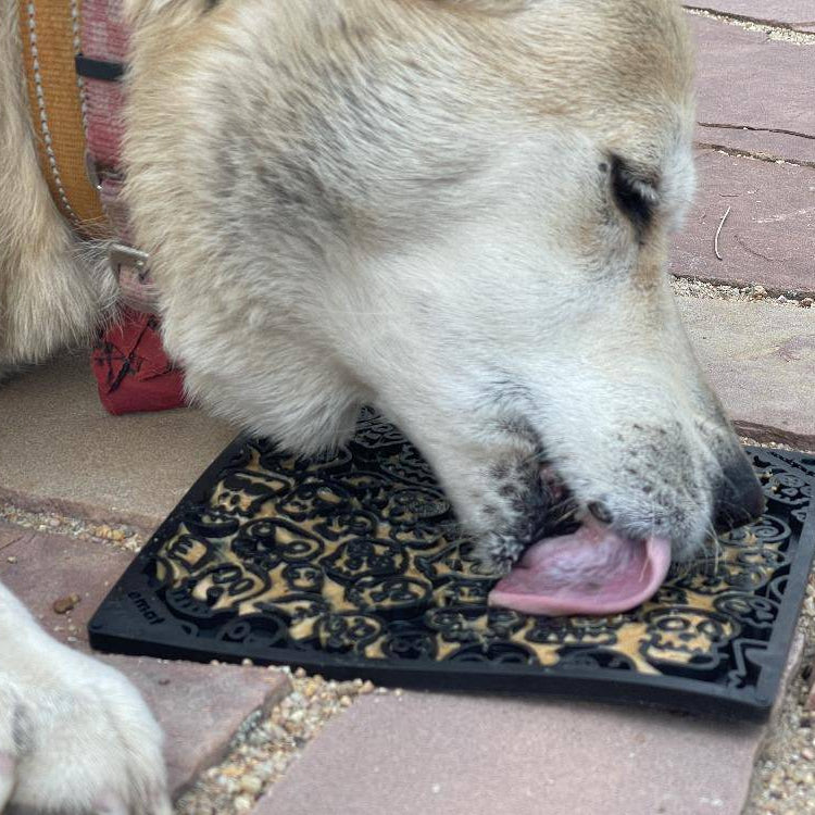 Black EMAT Zombie Design Enrichment Lick Mat for dogs by SodaPup/True Dogs, LLC, showing the zombie-themed pattern.