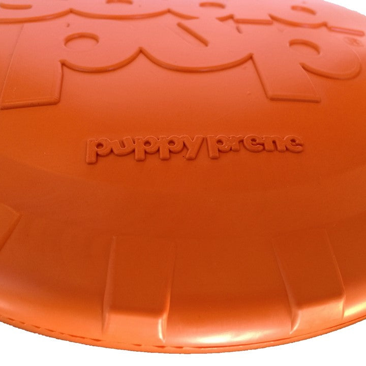 Orange Rubber Bottle Top Flyer dog toy by SodaPup, durable retrieving frisbee for dogs, 9.75-inch rubber disc.