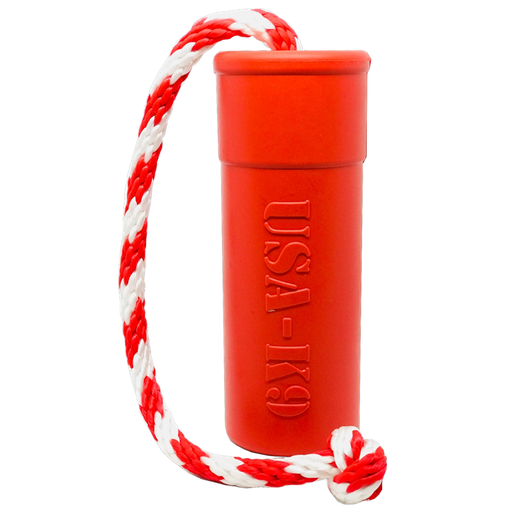 Large red USA-K9 Firecracker Rubber Dog Toy, durable floating training dummy by SodaPup/True Dogs, LLC for fetch and training.
