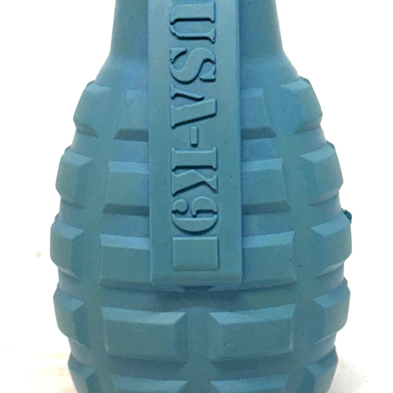 Red SodaPup USA-K9 Grenade rubber dog toy and treat dispenser, durable chew toy with textured surface for dogs.
