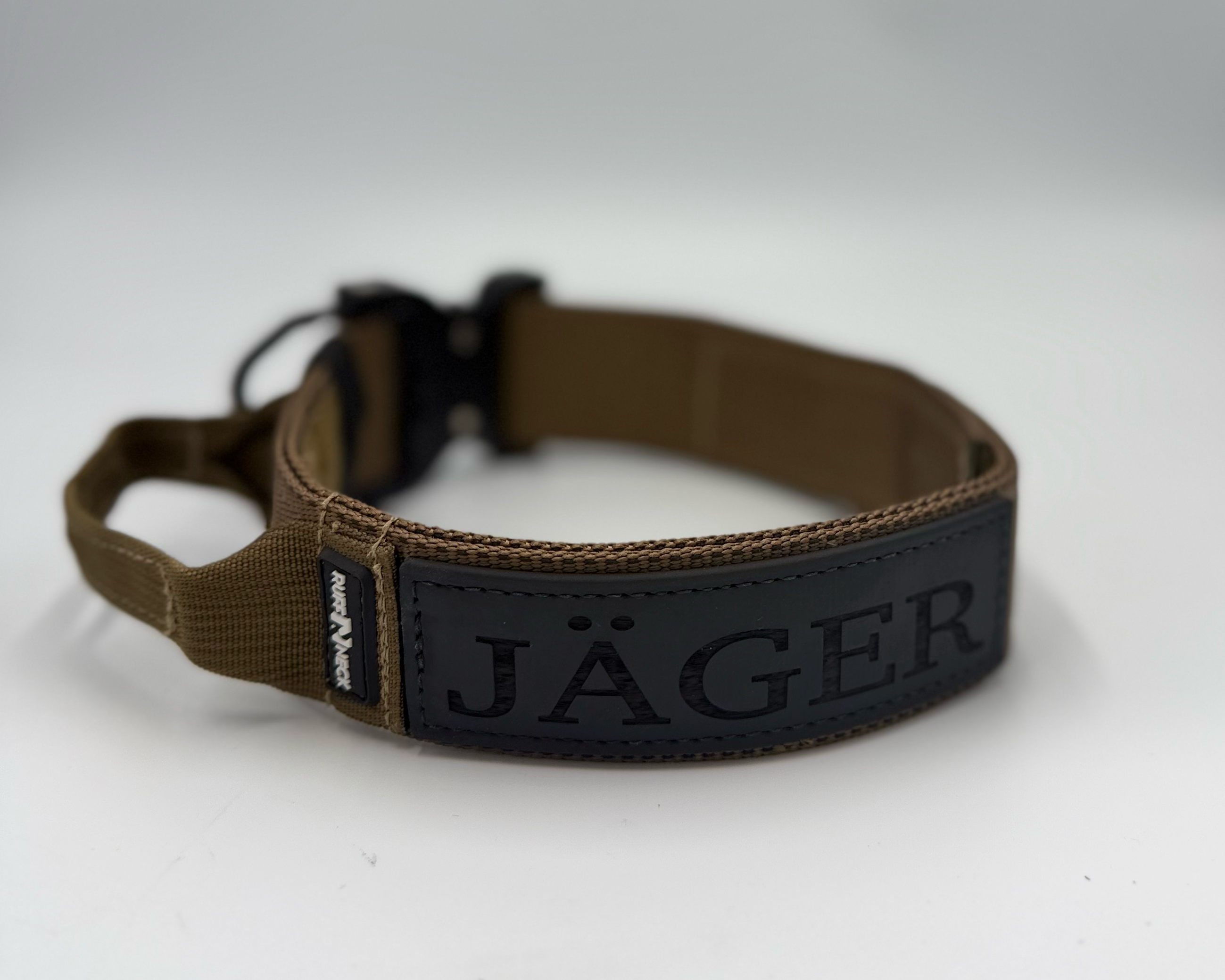 Titan Tactical Elite Dog Collar featuring 1.75" Mil-Spec Type 13 nylon webbing, a genuine AustriAlpin COBRA® Integrated D-Ring Buckle, RuffLock Retained Handle System, and the exclusive RuffTag Personalized BioThane Identification System. Handmade in the USA by American Ruffneck Collars. Rear view with deployed handle.