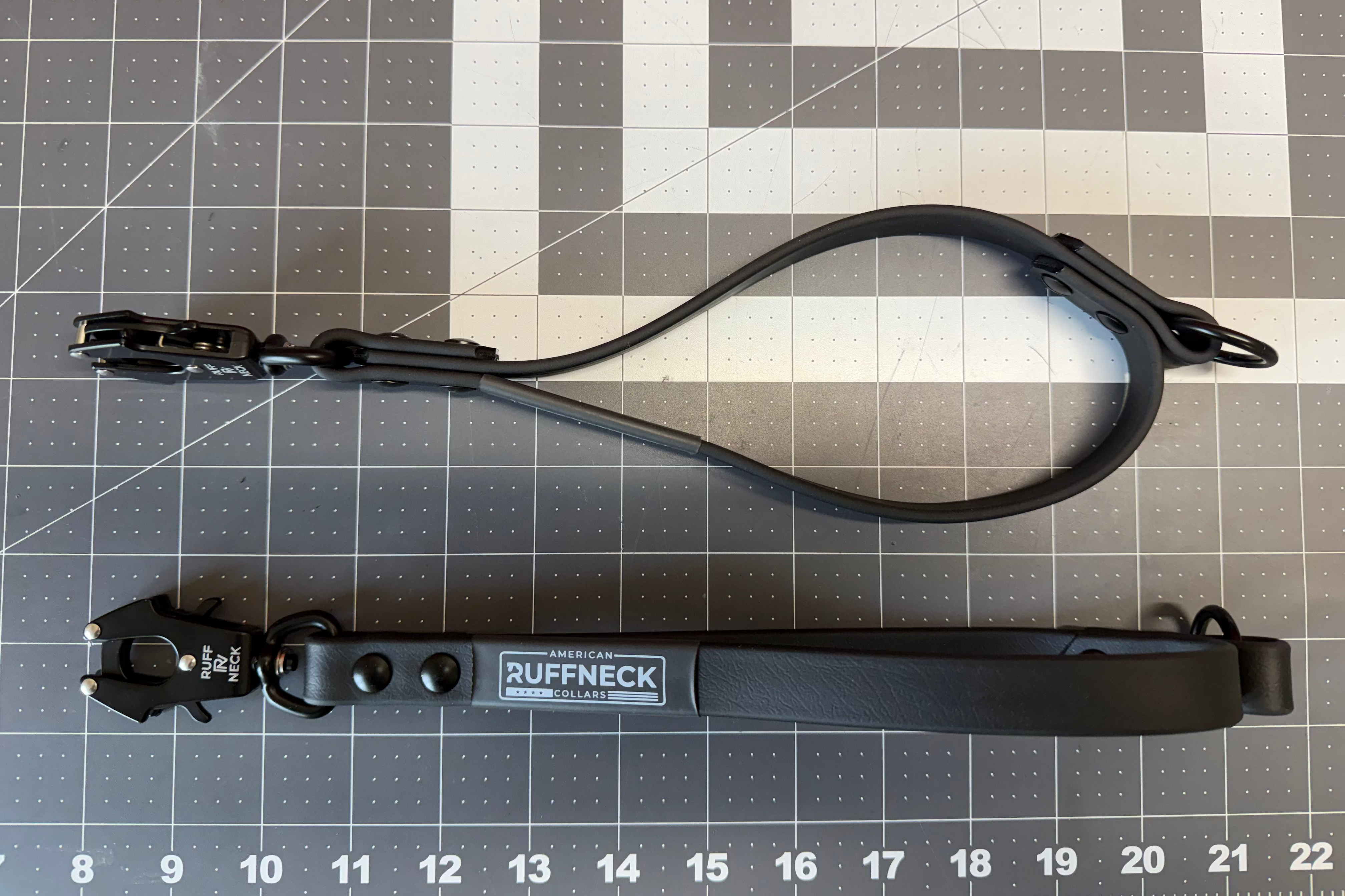 Close Quarters Control dog leash by American Ruffneck Collars, black nylon leash with metal clip for secure walking.