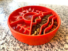 SodaPup/True Dogs EBOWL slow feeder dog bowl with outdoor-themed Great Outdoors design in orange, for enrichment and feeding.