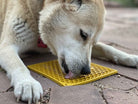Large yellow Honeycomb Design EMAT Enrichment Lick Mat by SodaPup/True Dogs, LLC, showing textured honeycomb surface for dog enrichment