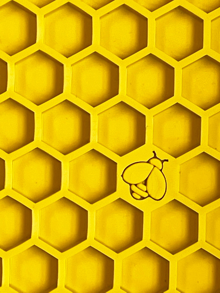 Large yellow SodaPup EMAT honeycomb design enrichment lick mat for dogs, made by True Dogs, LLC.