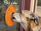 Orange SodaPup EMAT Camp eMat enrichment lick mat for dogs, featuring textured surface for mental stimulation and fun.