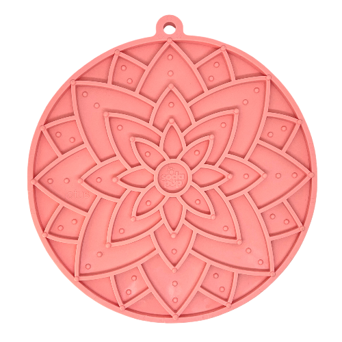 Pastel purple Lotus Design eMat Enrichment Lick Mat with suction cups by SodaPup/True Dogs, LLC, for dog enrichment.