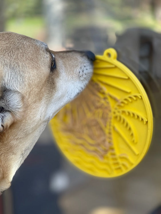 SodaPup Sun n' Sea eMat Enrichment Lick Mat with suction cups, bright yellow, designed for dog enrichment and slow feeding.