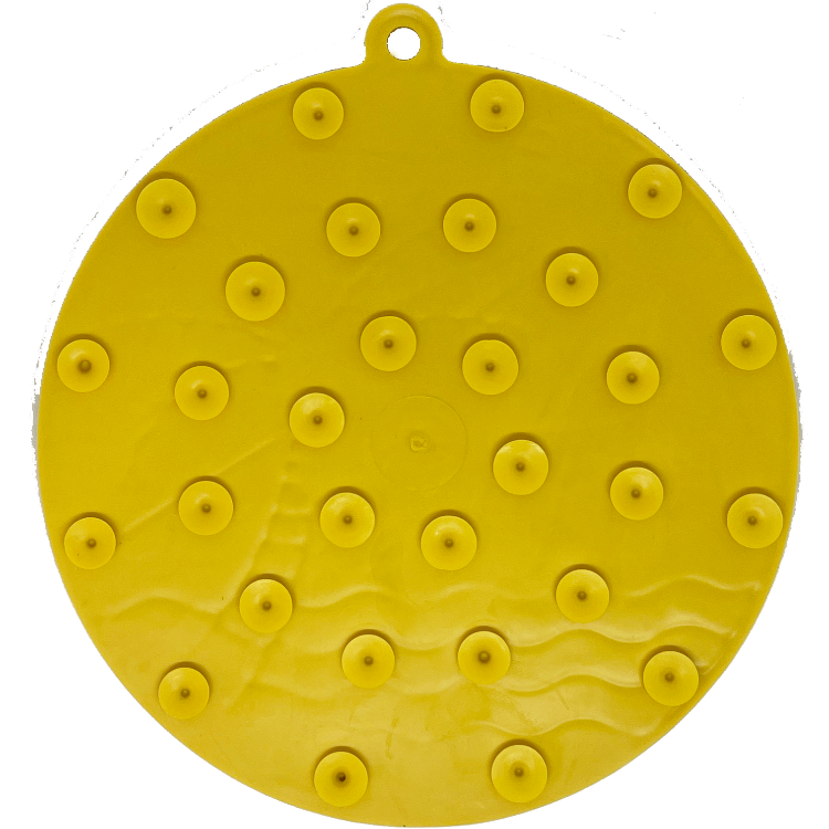 Yellow Sun n' Sea EMAT enrichment lick mat with suction cups for dogs by SodaPup/True Dogs, LLC, shown on a surface.