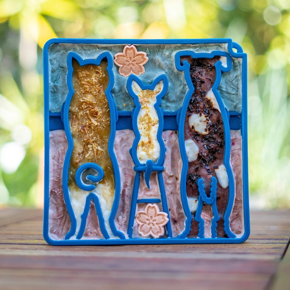 Blue Waiting Dogs design eTray enrichment tray for dogs by SodaPup/True Dogs, LLC, featuring a playful dog pattern.