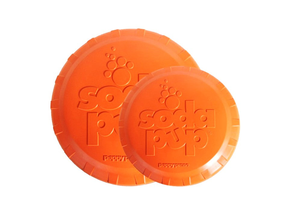 Orange Rubber Dog Frisbee from SodaPup, durable retrieving toy with bottle top design for active play and fetch.